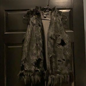 Faux black rabbit fur vest.